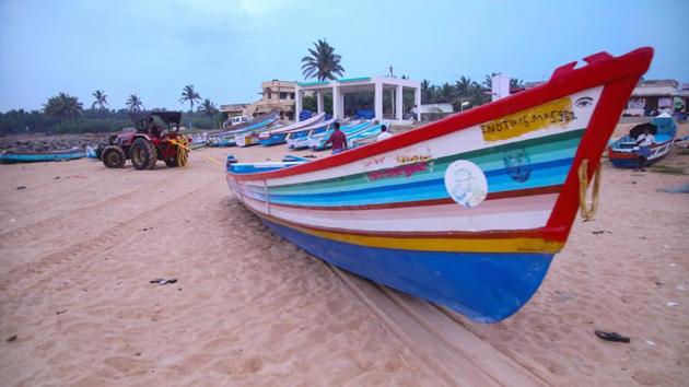 A fishing boat is pulled back to shore with other belongings in Kanyakumari on December 2. Burevi has been making its way towards India’s south after crossing Sri Lanka on December 2, rattling the island nation but leaving it relatively unscathed. (PTI) A fishing boat is pulled back to shore with other belongings in Kanyakumari on December 2. Burevi has been making its way towards India’s south after crossing Sri Lanka on December 2, rattling the island nation but leaving it relatively unscathed. (PTI)