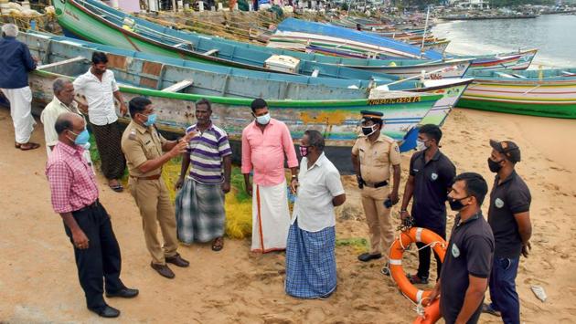Police personnel and coast guard wardens brief fishermen residing near Vizhinjam seashore in Thiruvananthapuram on December 2. The Kerala state government had declared a public holiday on December 4 for five districts in view of the red alert which was issued earlier. Meanwhile, the Thiruvananthapuram International Airport has rescheduled nine flights and closed operations for eight hours from 10am to 6pm to ensure safety. (PTI) Police personnel and coast guard wardens brief fishermen residing near Vizhinjam seashore in Thiruvananthapuram on December 2. The Kerala state government had declared a public holiday on December 4 for five districts in view of the red alert which was issued earlier. Meanwhile, the Thiruvananthapuram International Airport has rescheduled nine flights and closed operations for eight hours from 10am to 6pm to ensure safety. (PTI)