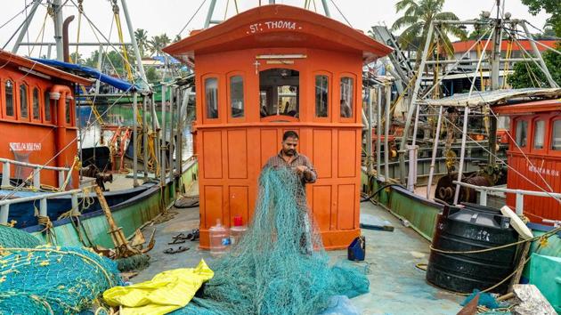 A fisherman untangles his nets on a boat at Kalamukku harbour in Kochi on December 2. All fishing activity has been halted in the view of Cyclone Burevi. Fishermen have been advised not to venture into southwestern Bay of Bengal and along and off east Sri Lanka coast on December 3 and over Lakshadweep-Maldives adjoining the southeast Arabian Sea from December 3 to 5. (PTI) A fisherman untangles his nets on a boat at Kalamukku harbour in Kochi on December 2. All fishing activity has been halted in the view of Cyclone Burevi. Fishermen have been advised not to venture into southwestern Bay of Bengal and along and off east Sri Lanka coast on December 3 and over Lakshadweep-Maldives adjoining the southeast Arabian Sea from December 3 to 5. (PTI)