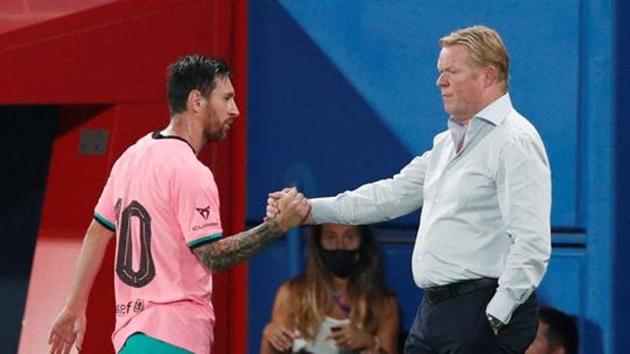 Barcelona's Lionel Messi shakes hands with coach Ronald Koeman.(REUTERS) Barcelona's Lionel Messi shakes hands with coach Ronald Koeman.(REUTERS)