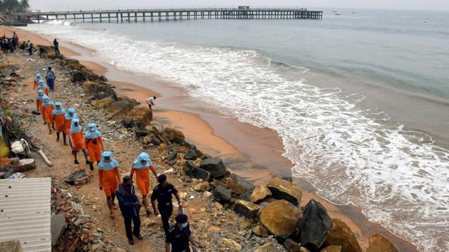 A NDRF team patrols the seashore in Valiyathura on December 3. Burevi is the region’s second cyclonic system in a week after Nivar, a more powerful cyclone which skirted northern Sri Lanka but hit Tamil Nadu with force, uprooting trees and delivering 30 centimetres of rain in some areas, AFP reported. (PTI) A NDRF team patrols the seashore in Valiyathura on December 3. Burevi is the region’s second cyclonic system in a week after Nivar, a more powerful cyclone which skirted northern Sri Lanka but hit Tamil Nadu with force, uprooting trees and delivering 30 centimetres of rain in some areas, AFP reported. (PTI)