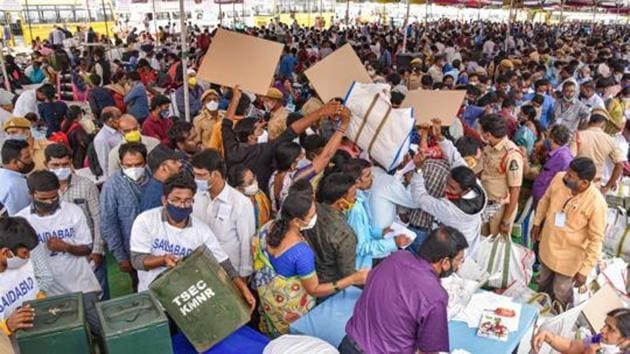 Polling officers collect election materials ahead of the Greater Hyderabad Municipal Corporation (GHMC) elections in Hyderabad in this file photo.(PTI Photo)