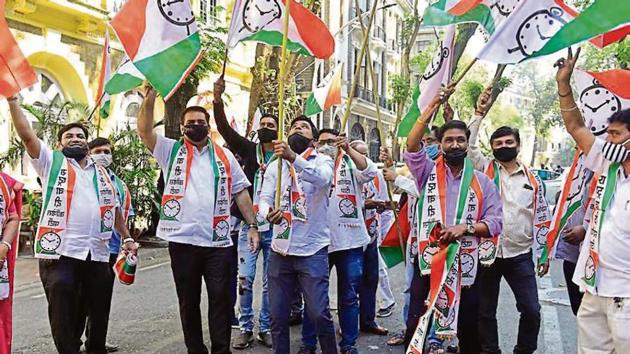 NCP workers celebrate the election results in Mumbai on Friday. (Anshuman Poyrekar/HT photo) NCP workers celebrate the election results in Mumbai on Friday. (Anshuman Poyrekar/HT photo)