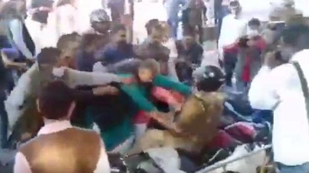 BJP leaders were accused of manhandling Jhansi superintendent of police during counting of votes for Allahabad-Jhansi division graduates’ constituency seat.(Courtesy- Twitter) BJP leaders were accused of manhandling Jhansi superintendent of police during counting of votes for Allahabad-Jhansi division graduates’ constituency seat.(Courtesy- Twitter)