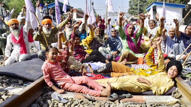 Children shout slogans as they join their families and farmers during the 'Rail Roko' protest against the new agriculture laws.(Sameer Sehgal/Hindustan Times) Children shout slogans as they join their families and farmers during the 'Rail Roko' protest against the new agriculture laws.(Sameer Sehgal/Hindustan Times)