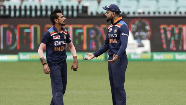 India's captain Virat Kohli, right, talks to bowler Yuzendra Chahal during the one day international cricket match between India and Australia at the Sydney Cricket Ground in Sydney. (AP) India's captain Virat Kohli, right, talks to bowler Yuzendra Chahal during the one day international cricket match between India and Australia at the Sydney Cricket Ground in Sydney. (AP)