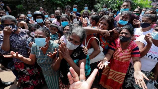 Family members of inmates react outside the prison, following unrest at Mahara Prison, on the outskirts of Colombo, Sri Lanka on November 30. At least 11 inmates were killed in a riot that broke out over rising coronavirus infections in the prison. Authorities used force when some inmates tried to escape. (Dinuka Liyanawatte / REUTERS) Family members of inmates react outside the prison, following unrest at Mahara Prison, on the outskirts of Colombo, Sri Lanka on November 30. At least 11 inmates were killed in a riot that broke out over rising coronavirus infections in the prison. Authorities used force when some inmates tried to escape. (Dinuka Liyanawatte / REUTERS)