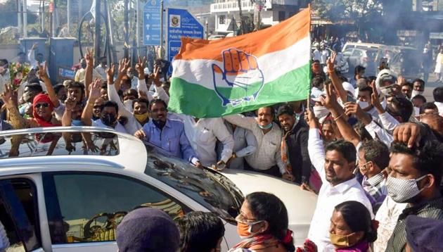 Congress workers celebrate party candidate Abhijit Wanjari's lead in the Counil elections in Nagpur on Friday. (PTI) Congress workers celebrate party candidate Abhijit Wanjari's lead in the Counil elections in Nagpur on Friday. (PTI)