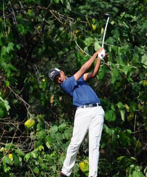 Golfer Veer Ahlawat playing a shot during the Jeev Milkha Singh invitational Golf Tournament at Golf Club in Chandigarh on Saturday. (Ravi Kumar/HT) Golfer Veer Ahlawat playing a shot during the Jeev Milkha Singh invitational Golf Tournament at Golf Club in Chandigarh on Saturday. (Ravi Kumar/HT)