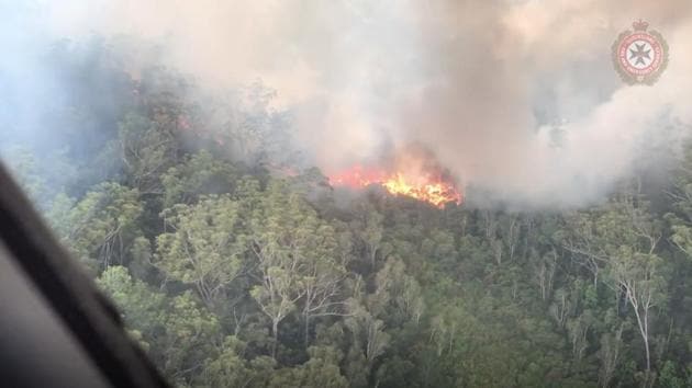 An aerial view shows bushfires on Fraser Island, Queensland, Australia, in this still image taken from video released on December 2, 2020.(Reuters)
