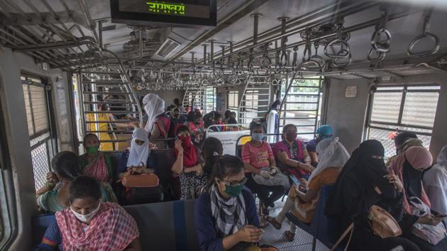 Women passengers travel in local trains at Jogeshwari station in Mumbai. (Satyabrata Tripathy/HT Photo) Women passengers travel in local trains at Jogeshwari station in Mumbai. (Satyabrata Tripathy/HT Photo)