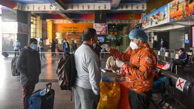 A health worker collects a swab sample from a traveller for coronavirus test at New Delhi Railway Station (NDLS) in New Delhi on December 6. RT-PCR tests are significantly better than rapid antigen tests at detecting positive cases – the latter has a higher tendency to give false negative. As a result, the higher the share of RT-PCR tests in overall testing, the more accurate the positivity rate is. (Amal KS / HT Photo) A health worker collects a swab sample from a traveller for coronavirus test at New Delhi Railway Station (NDLS) in New Delhi on December 6. RT-PCR tests are significantly better than rapid antigen tests at detecting positive cases – the latter has a higher tendency to give false negative. As a result, the higher the share of RT-PCR tests in overall testing, the more accurate the positivity rate is. (Amal KS / HT Photo)
