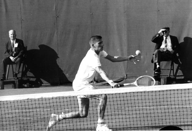 FILE - In this Sept. 3, 1965, file photo, Dennis Ralston, of Bakersfield, Calif., gets in position to return the ball during a first round singles match with Jim Hobson in the National Tennis Championships at Forest Hills in the Queens borough of New York. Ralston, a five-time Grand Slam doubles champion who was one of the initial players signed to the professional World Championship Tennis tour in the 1960s and an International Tennis Hall of Fame inductee, died Sunday, Dec. 6, 2020. He was 78. (AP) FILE - In this Sept. 3, 1965, file photo, Dennis Ralston, of Bakersfield, Calif., gets in position to return the ball during a first round singles match with Jim Hobson in the National Tennis Championships at Forest Hills in the Queens borough of New York. Ralston, a five-time Grand Slam doubles champion who was one of the initial players signed to the professional World Championship Tennis tour in the 1960s and an International Tennis Hall of Fame inductee, died Sunday, Dec. 6, 2020. He was 78. (AP)