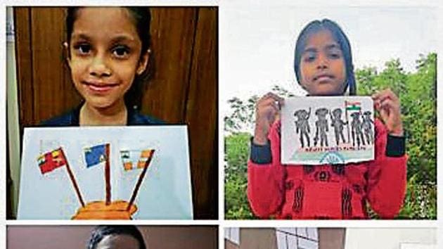 Children showing their posters during the virtual activity. (HT File) Children showing their posters during the virtual activity. (HT File)