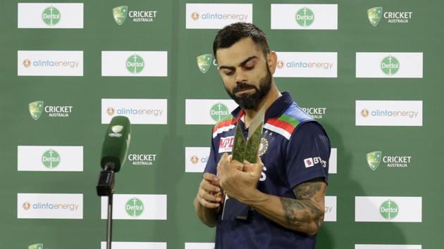India's captain Virat Kohli holds the winners trophy at the end of the third T20 international cricket match between Australia and India at the Sydney Cricket Ground in Sydney, Australia, Tuesday, Dec. 8, 2020. Indian won the series 2-1. (AP Photo/Rick Rycroft)(AP) India's captain Virat Kohli holds the winners trophy at the end of the third T20 international cricket match between Australia and India at the Sydney Cricket Ground in Sydney, Australia, Tuesday, Dec. 8, 2020. Indian won the series 2-1. (AP Photo/Rick Rycroft)(AP)