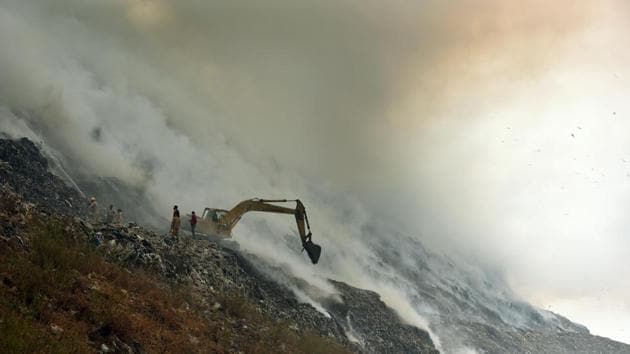 Firefighters spray water to extinguish fire at Ghazipur garbage landfill, in New Delhi on November 25. (HT file) Firefighters spray water to extinguish fire at Ghazipur garbage landfill, in New Delhi on November 25. (HT file)