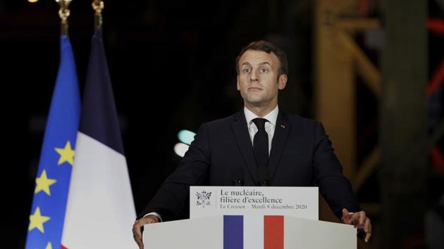 French President Emmanuel Macron also pledged 500 million euros in investment in the nuclear industry. (AP) French President Emmanuel Macron also pledged 500 million euros in investment in the nuclear industry. (AP)
