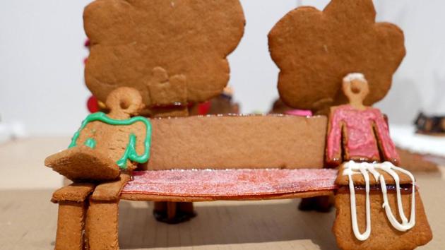 Two gingerbread figures sitting apart on a bench to illustrate social distancing are seen during the annual gingerbread baking competition at Arkdes Museum of Architecture and Design in Stockholm, Sweden December 7, 2020. Due to the coronavirus disease (COVID-19) outbreak the competition has moved online.(REUTERS)