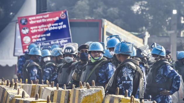 Security personnel at the Singhu border during Bharat Bandh, in New Delhi on December 8. (PTI) Security personnel at the Singhu border during Bharat Bandh, in New Delhi on December 8. (PTI)