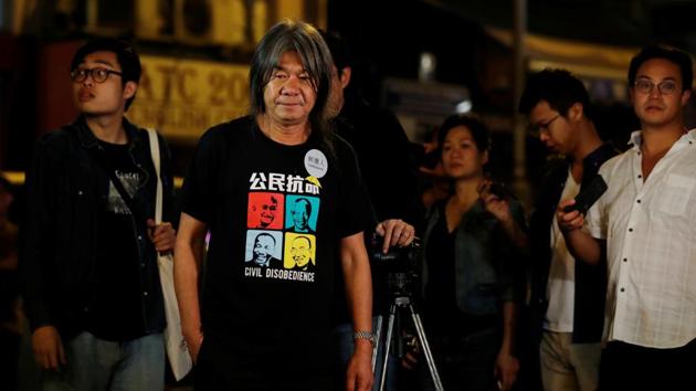 Lawmaker, activist and one of the candidates in Hong Kong council elections, Leung Kwok-hung stands outside a counting center, in Hong Kong, China. He is among 8 activists arrested by the Hong Kong police. (Reuters/ File photo) Lawmaker, activist and one of the candidates in Hong Kong council elections, Leung Kwok-hung stands outside a counting center, in Hong Kong, China. He is among 8 activists arrested by the Hong Kong police. (Reuters/ File photo)