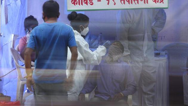 India’s Covid-19 tally crossed the 2 million-mark on August 7, with the next million being reported in 17 days on August 23. It crossed the 4 million mark on September 5, and 5 million on September 16. (AP file photo) India’s Covid-19 tally crossed the 2 million-mark on August 7, with the next million being reported in 17 days on August 23. It crossed the 4 million mark on September 5, and 5 million on September 16. (AP file photo)
