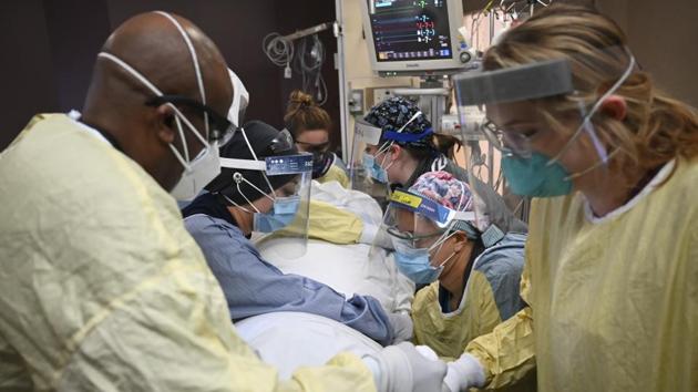 Virtually every state is reporting surges just as a vaccine appears days away from getting the go-ahead in the US. (AP) Virtually every state is reporting surges just as a vaccine appears days away from getting the go-ahead in the US. (AP)