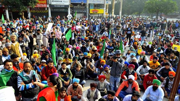 Members of various organizations demonstrating in support of farmers during a nationwide strike, in Sector 17, Chandigarh, India on Tuesday.(Keshav Singh/HT Photo)