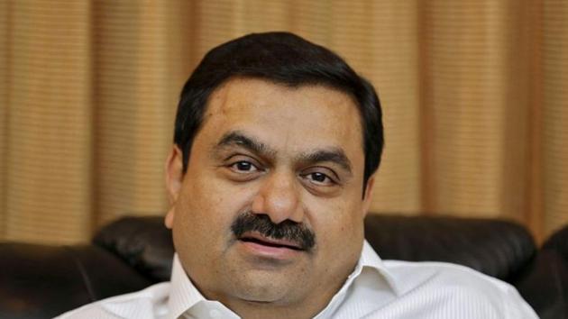 With its name echoing in farmer protests against agri reform bills, Adani Group has said it neither buys food grains from farmers nor decides the pricing of food grains (REUTERS) With its name echoing in farmer protests against agri reform bills, Adani Group has said it neither buys food grains from farmers nor decides the pricing of food grains (REUTERS)