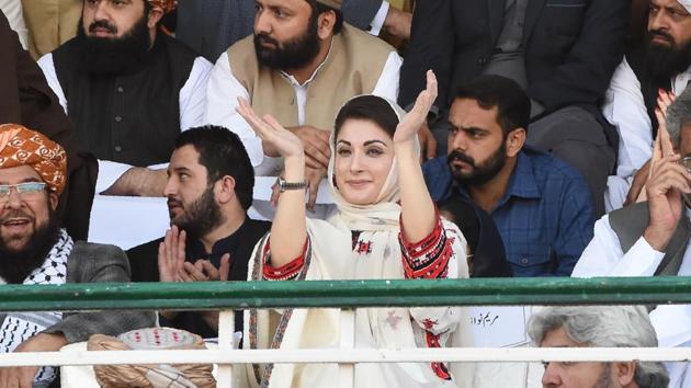 Maryam Nawaz (centre), daughter of Pakistan's former prime minister Nawaz Sharif, and the leader of Pakistan Democratic Movement (PDM), gestures to supporters during an anti-government rally in Quetta on October 25.(AFP file)