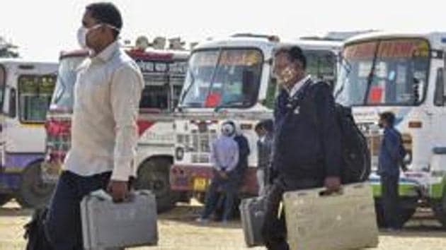 Polling officers leave for their stations to conduct elections of Panchayat Samiti and Zila Parishad members in 21 districts of Rajasthan. (PTI) Polling officers leave for their stations to conduct elections of Panchayat Samiti and Zila Parishad members in 21 districts of Rajasthan. (PTI)