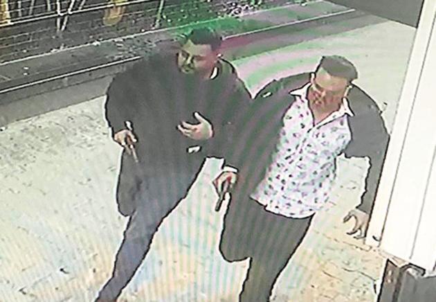 Two of the robbers were caught on camera while fleeing from the goldsmith’s shop in Sector 23, Chandigarh, on Wednesday. (HT Photo) Two of the robbers were caught on camera while fleeing from the goldsmith’s shop in Sector 23, Chandigarh, on Wednesday. (HT Photo)