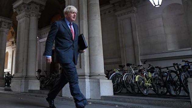 Britain's Prime Minister Boris Johnson walks to Downing Street in central London on September 22 after attending the weekly meeting of the cabinet at the Foreign, Commonwealth and Development Office .(AFP file)