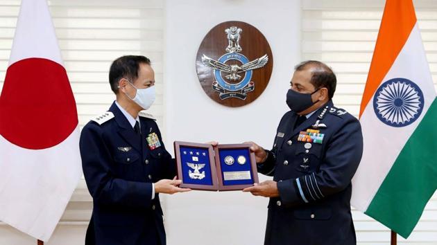 New Delhi: IAF Chief Air Chief Marshal RKS Bhadauria being presented memento by Japanese Chief of Staff of Air Force, General Izutsu Shunji during their meeting in New Delhi. (PTI) New Delhi: IAF Chief Air Chief Marshal RKS Bhadauria being presented memento by Japanese Chief of Staff of Air Force, General Izutsu Shunji during their meeting in New Delhi. (PTI)