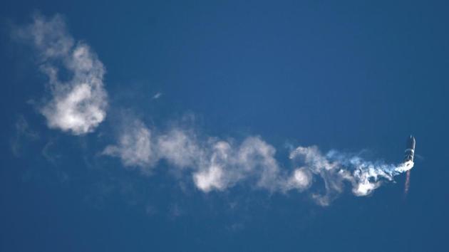 The Starship SN8 rocket in flight after it launched from Boca Chica on December 9. Musk said in a tweet immediately following the landing mishap that the rocket’s “fuel header tank pressure was low” during descent, “causing touchdown velocity to be high.” He added that SpaceX had obtained “all the data we needed” from the test and hailed the rocket’s ascent phase a success. (Gene Blevins / REUTERS)