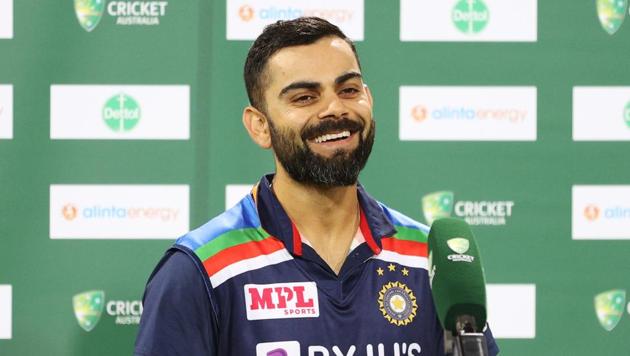 Cricket - Third Twenty20 International - Australia v India - Sydney Cricket Ground, Sydney, Australia - December 8, 2020 India's Virat Kohli talks to the media as he celebrates after winning the series REUTERS/Loren Elliott (REUTERS) Cricket - Third Twenty20 International - Australia v India - Sydney Cricket Ground, Sydney, Australia - December 8, 2020 India's Virat Kohli talks to the media as he celebrates after winning the series REUTERS/Loren Elliott (REUTERS)