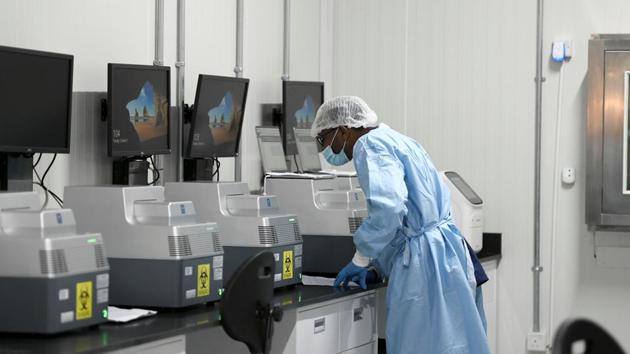A medical worker wearing a protective suit and face mask works at the Biogenix Laboratories, which performs COVID-19 detection tests in Masdar City, Abu Dhabi, United Arab Emirates. (REUTERS) A medical worker wearing a protective suit and face mask works at the Biogenix Laboratories, which performs COVID-19 detection tests in Masdar City, Abu Dhabi, United Arab Emirates. (REUTERS)