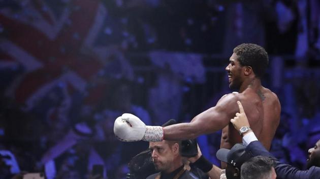 FILE - In this file photo dated Sunday Dec. 8, 2019, Britain's Anthony Joshua celebrates after beating Andy Ruiz Jr.(AP)