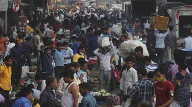 A view of a vegetable market packed with people in Mumbai on December 10. According to the Health Ministry’s data, Kerala, Maharashtra, Delhi, West Bengal, Uttar Pradesh, Rajasthan, Chhattisgarh, Haryana, Madhya Pradesh and Gujarat are reporting 75 per cent of the new Covid-19 cases. (Rafiq Maqbool / AP) A view of a vegetable market packed with people in Mumbai on December 10. According to the Health Ministry’s data, Kerala, Maharashtra, Delhi, West Bengal, Uttar Pradesh, Rajasthan, Chhattisgarh, Haryana, Madhya Pradesh and Gujarat are reporting 75 per cent of the new Covid-19 cases. (Rafiq Maqbool / AP)