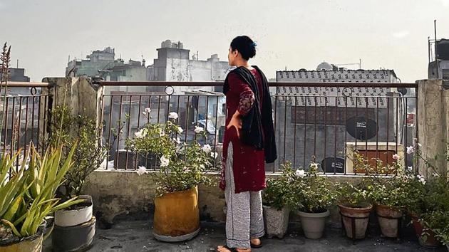 This little rose garden was set up a decade ago by Shahnawaz Khan, an MCD (Municipal Council of Delhi) staffer, who lives with his family, composed of his father, sister, wife and children. He is in the office at the moment, and his sister Mahvish is leading the way to the rooftop escape. (Mayank Austen Soofi) This little rose garden was set up a decade ago by Shahnawaz Khan, an MCD (Municipal Council of Delhi) staffer, who lives with his family, composed of his father, sister, wife and children. He is in the office at the moment, and his sister Mahvish is leading the way to the rooftop escape. (Mayank Austen Soofi)