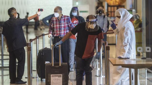 File photo: Passengers arrive at Chhatrapati Shivaji Maharaj International Airport amid Covid-19 pandemic.(Satyabrata Tripathy/HT Photo)
