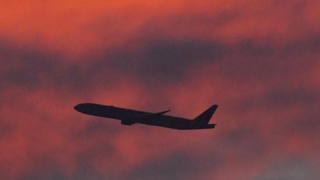 A plane is seen shortly after take-off at sunset, from Heathrow Airport, London, Britain.(REUTERS) A plane is seen shortly after take-off at sunset, from Heathrow Airport, London, Britain.(REUTERS)