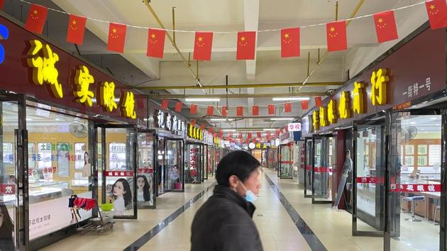 On the second floor above the empty market, shops selling glasses and optometry equipment reopened in June(REUTERS) On the second floor above the empty market, shops selling glasses and optometry equipment reopened in June(REUTERS)