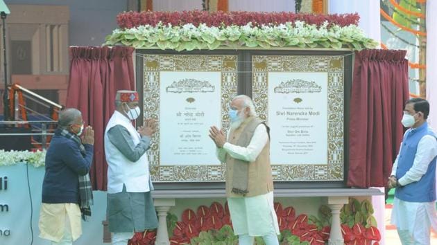 Prime Minister Narendra Modi unveiling the plaque to lay the foundation stone of the New Parliament Building as Lok Sabha speaker Om Birla, Union Minister for Parliamentary Affairs, Coal and Mines, Pralhad Joshi looks on, at Sansad Marg in New Delhi.(ANI Photo)