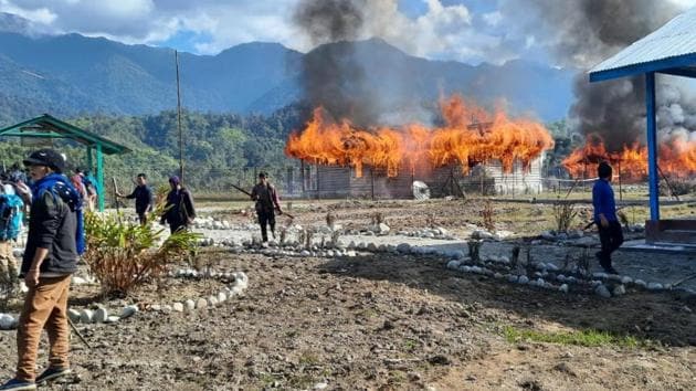 Youths damaging government property in Vijoynagar area of Changlang district in Arunachal Pradesh on Friday.(Photo courtesy: The Arunachal Times/Twitter)