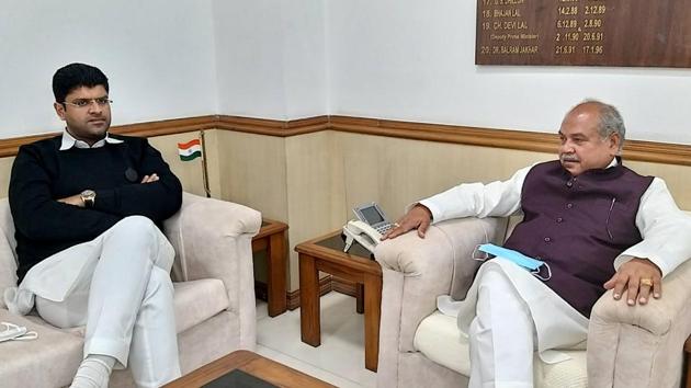 Haryana Deputy Chief Minister Dushyant Chautala with Union Agriculture Minister Narendra Singh Tomar. (PTI) Haryana Deputy Chief Minister Dushyant Chautala with Union Agriculture Minister Narendra Singh Tomar. (PTI)