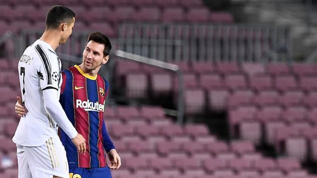 Juventus' Portuguese forward Cristiano Ronaldo greets Barcelona's Argentinian forward Lionel Messi (R) before the UEFA Champions League group G football match between Barcelona and Juventus at the Camp Nou stadium in Barcelona, Spain on December 8. It was the first meeting between Ronaldo and Messi since the former left Real Madrid for Juventus in 2018. (Josep Lago / AFP) Juventus' Portuguese forward Cristiano Ronaldo greets Barcelona's Argentinian forward Lionel Messi (R) before the UEFA Champions League group G football match between Barcelona and Juventus at the Camp Nou stadium in Barcelona, Spain on December 8. It was the first meeting between Ronaldo and Messi since the former left Real Madrid for Juventus in 2018. (Josep Lago / AFP)