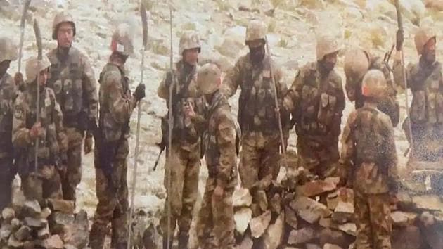 Chinese soldiers armed with spears and rifles, which were used during the Galwan Valley clash in June.