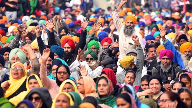 Farmers shout anti-government slogans during a protest against new farm laws at the Delhi-Haryana state border, India. As the protest over contentious farm laws continues to intensify, in New Delhi, India, on Sunday, December 13, 2020.(Raj K Raj/ Hindustan Times)