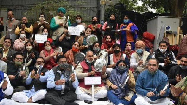 The mayors and office-bearers of the three municipal corporations have been sitting on protest outside Delhi chief minister Arvind Kejriwal’s residence since December 7, demanding immediate release of <span class='webrupee'>₹</span>13,000 crore to the corporations. (Photo @JPBhaiBJP)