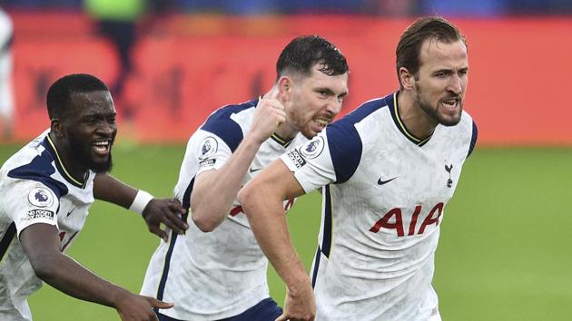 Tottenham's Harry Kane, right, celebrates with teammates after scoring the opening goal of the game during their English Premier League soccer match between Crystal Palace and Tottenham Hotspur at Selhurst Park in London, Sunday, Dec., 13, 2020. (Glyn Kirk/ Pool via AP))(AP) Tottenham's Harry Kane, right, celebrates with teammates after scoring the opening goal of the game during their English Premier League soccer match between Crystal Palace and Tottenham Hotspur at Selhurst Park in London, Sunday, Dec., 13, 2020. (Glyn Kirk/ Pool via AP))(AP)